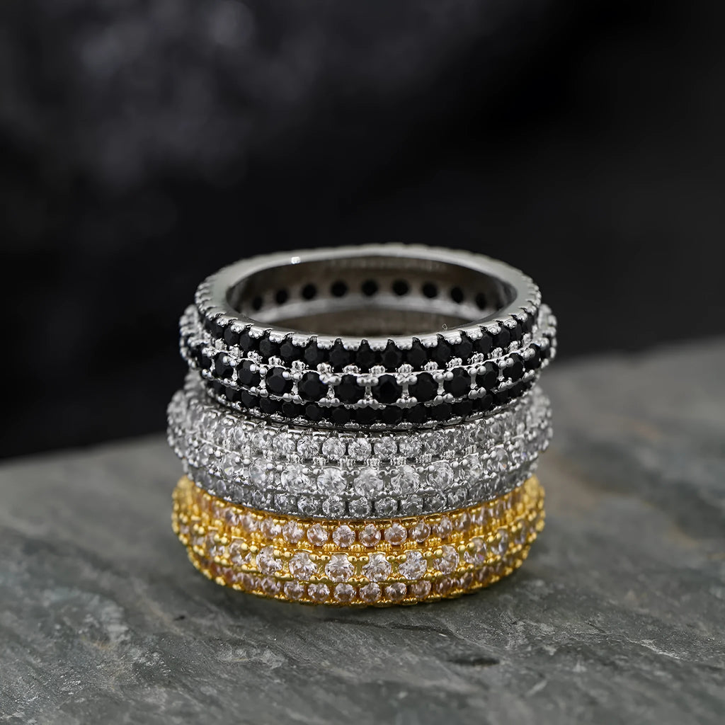 Geometric copper ring with a triangular zircon stone inlay, shown in white gold finish.