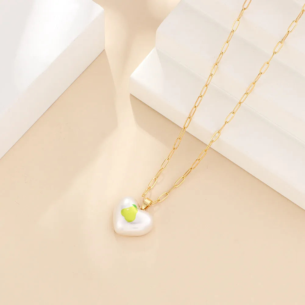 Adjustable geometric chain necklace with a choice of strawberry, pineapple, apple, pear or cherry fruit charm pendant.