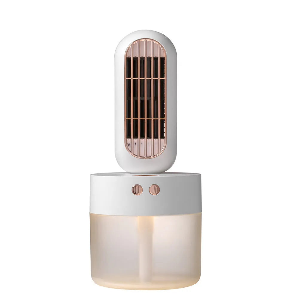 Small black and white humidifier fan with shaking head on a desktop