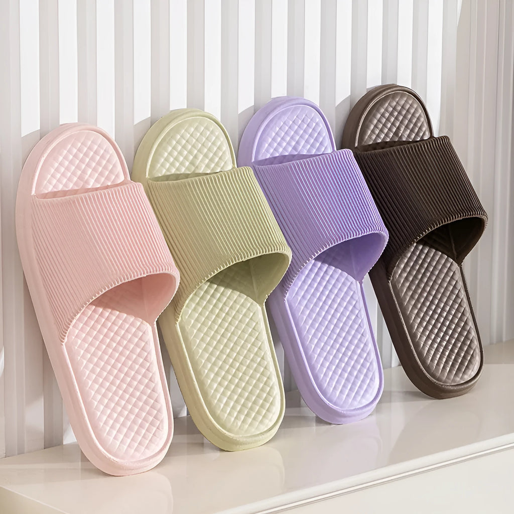 Pair of solid colour rhombus striped non-slip EVA foam indoor slippers