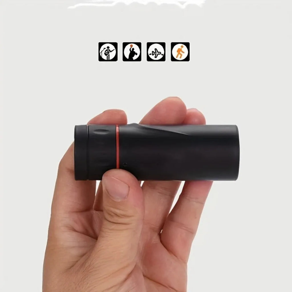 Black portable monocular telescope with a mobile phone holder attached