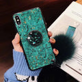 Silicone phone case with gold foil epoxy decoration in a purple solid colour, shown fitted on a smartphone.
