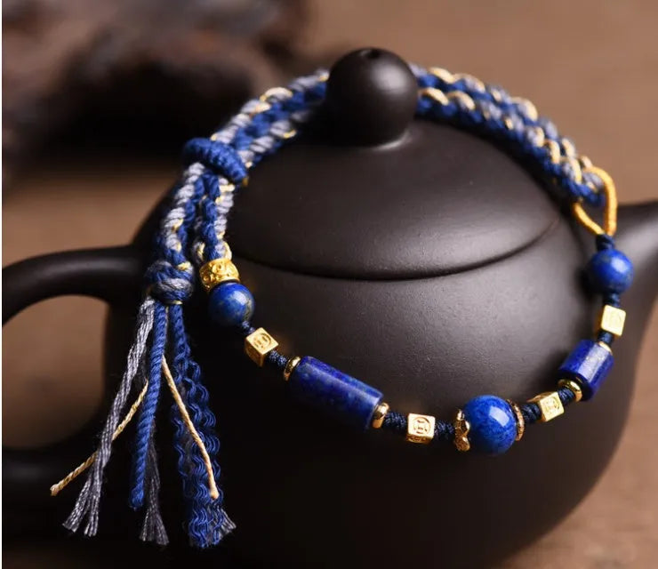 Hand woven DIY watch bracelet with lapis lazuli coloured rope and flexible wire in an ethnic style.