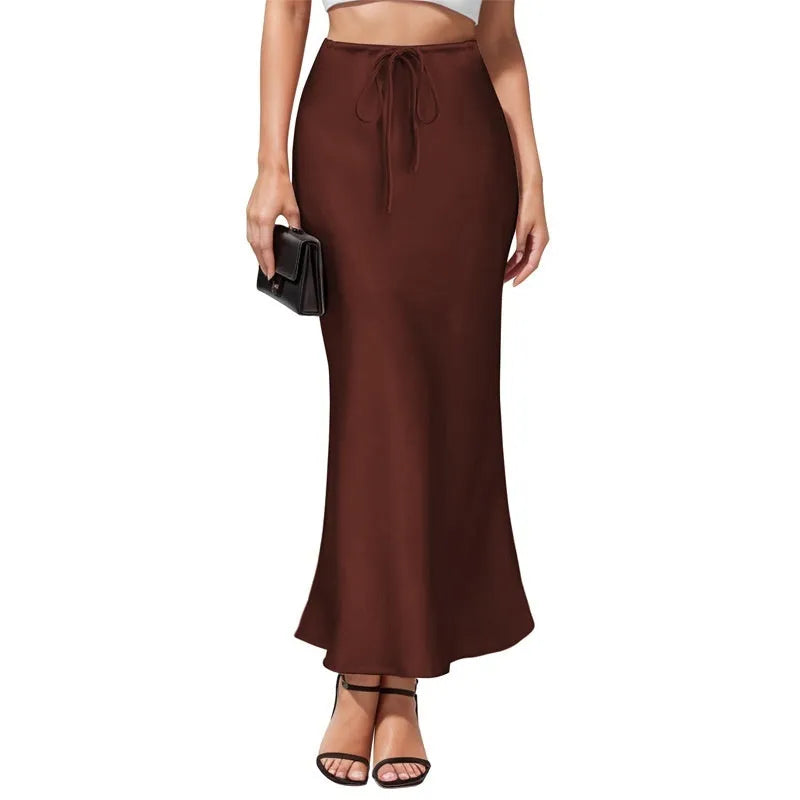 Asymmetric high-waist acetate satin skirt with irregular stitching in milky white