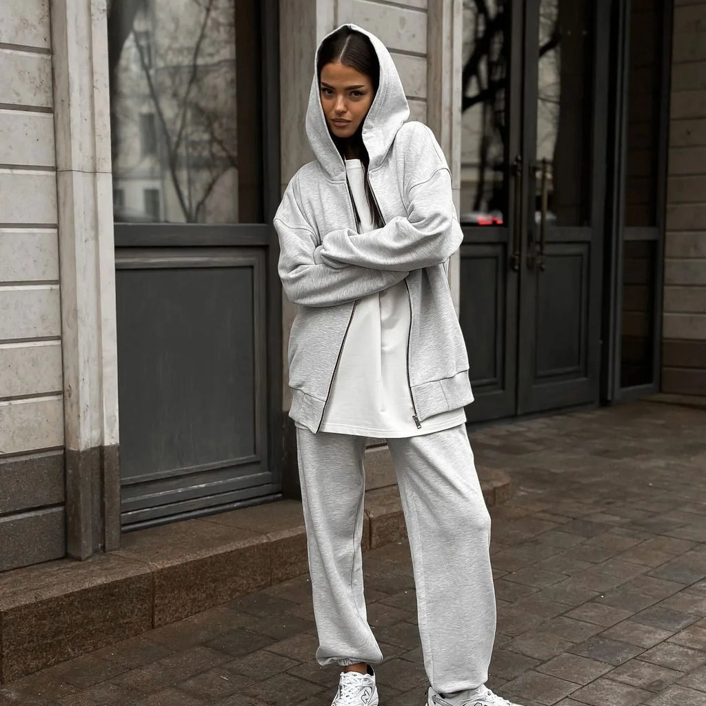 Street style loose fit two-piece set with long-sleeved coat and matching trousers in solid colour