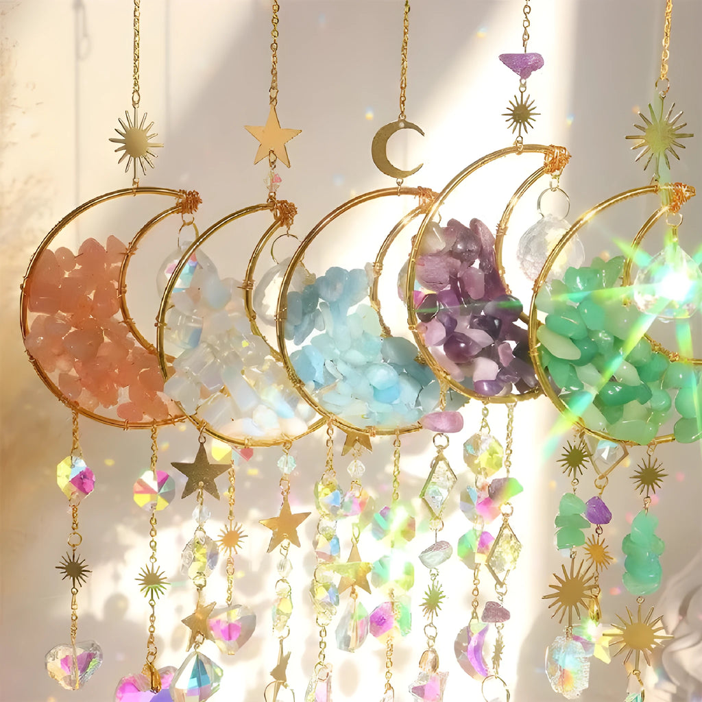 Car interior hanging pendant with large round crystal moon charm on a metal chain.