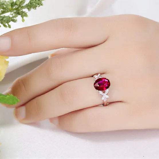 Women's 18k rose gold butterfly ring with heart shape design on copper material in red and blue colour options