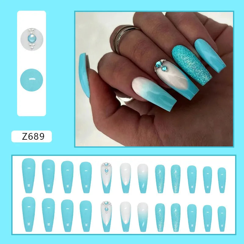 Solid colour long ballet false nails with blue diamond glitter and adhesive glue
