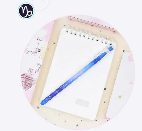 Box containing 12 constellation-themed quick-drying gel pens with plastic barrels