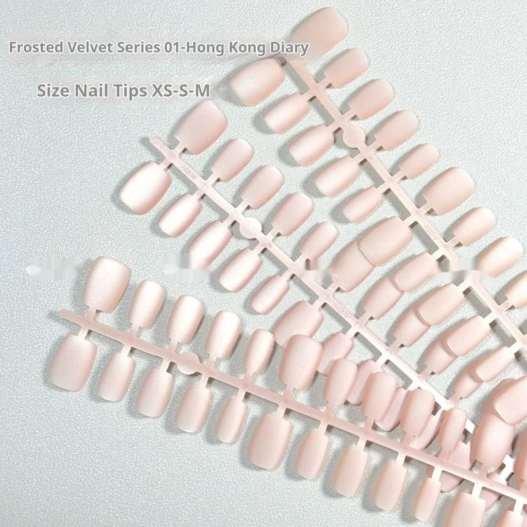 Frosted Velvet Cat's Eye press-on artificial nails showing Aurora and solid colour designs in short ladder shapes.