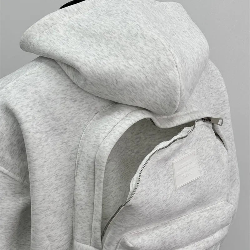 Light grey men's hoodie with backpack-style design on back, featuring a hood.