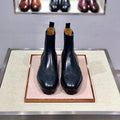 Black high-top business casual leather shoes with a cowhide upper and leather sole.