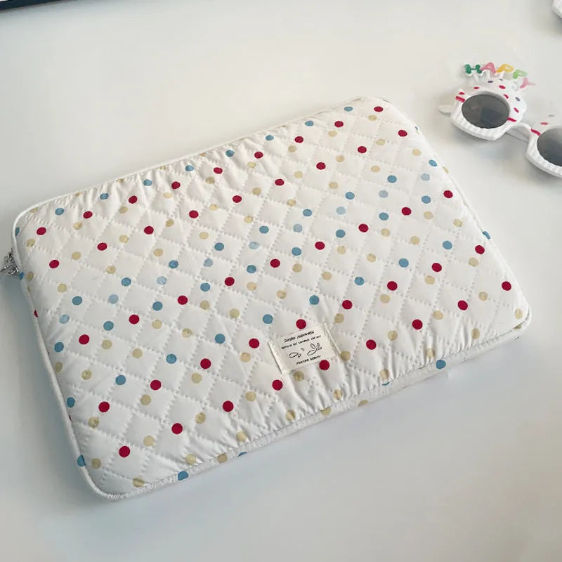 Women's polka dot polyester laptop bag shown in solid colour, suitable for 11-inch to 15.6-inch devices.
