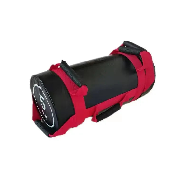 Flat white PVC fitness training sandbag shown in a gym setting for strength and conditioning workouts.
