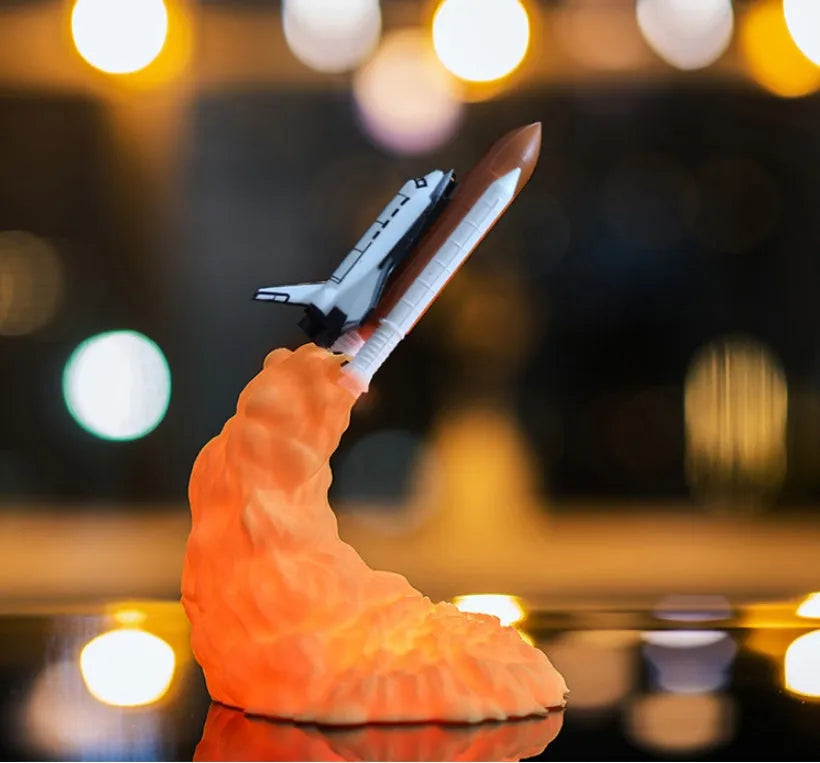 3D print rocket space shuttle lamp night light, 11 inch, PLA material, USB rechargeable, on display in a bedroom