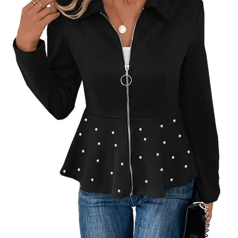 Women's black loose fit coat with a heavy-duty beaded zipper and a ruffled hem.