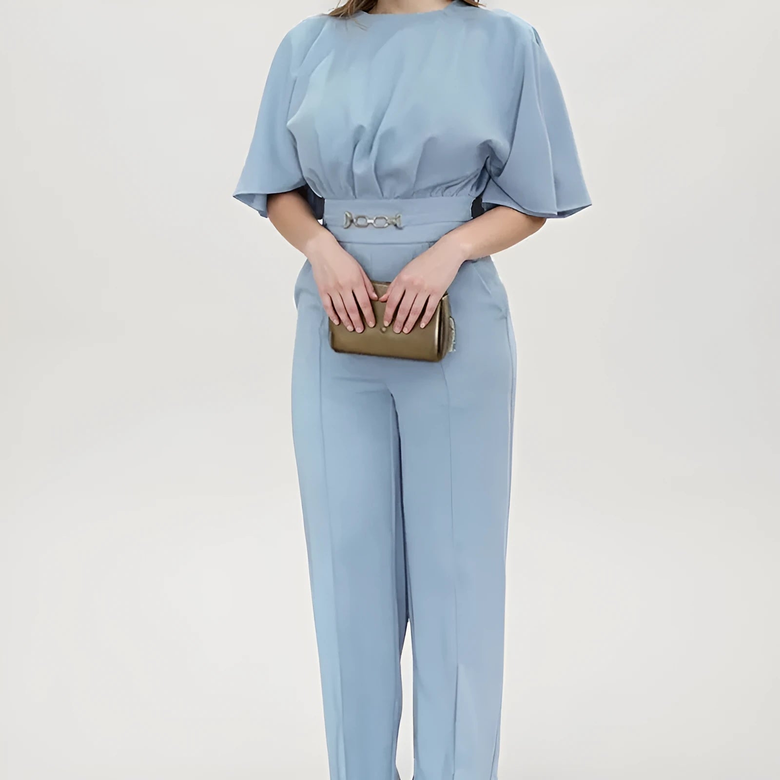 Men's blue two-piece polyester suit with long-sleeve jacket and trousers on hanger