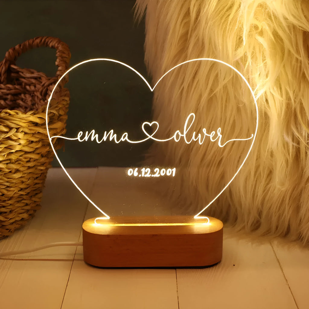 Custom transparent acrylic night light with LED base showing personalised text