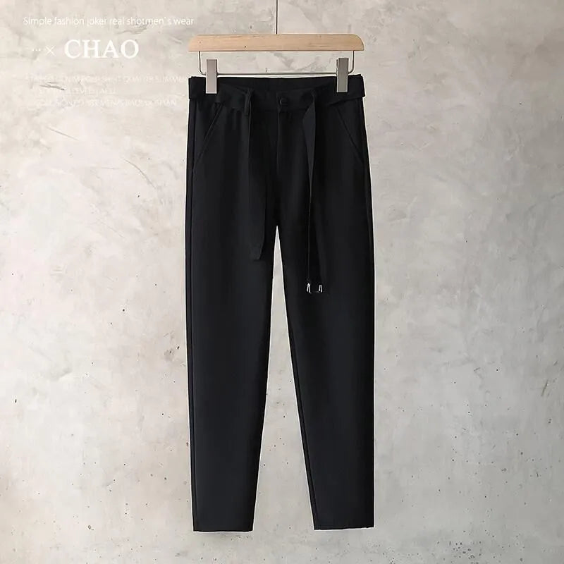 Boys slim straight wool trousers in tapered cut for business casual and street fashion.