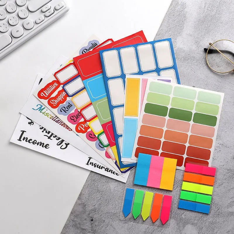 Handwritten labels and adhesive stickers showing grid configurations and colour options including white German adhesive stickers