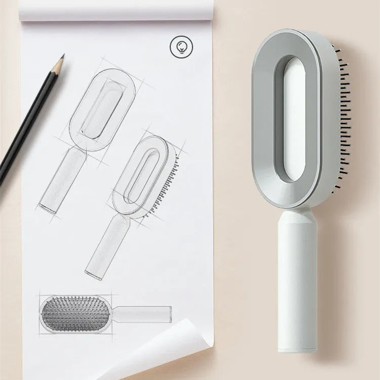 Self-cleaning hair brush with one-key button, air cushion base, and long bristles on a white background.