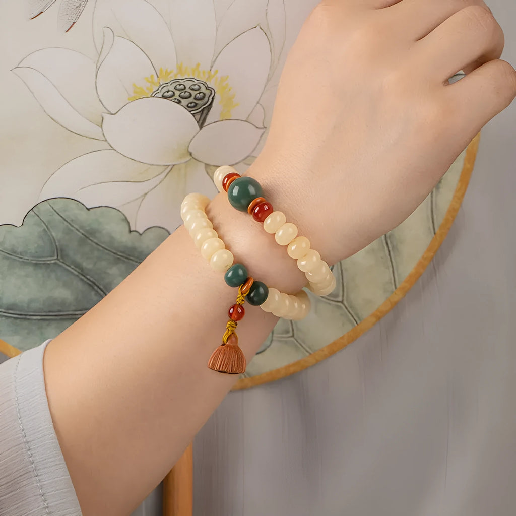 Wooden women's bracelet with milk butter bodhi beads in double ring design, beads measure 6x9mm