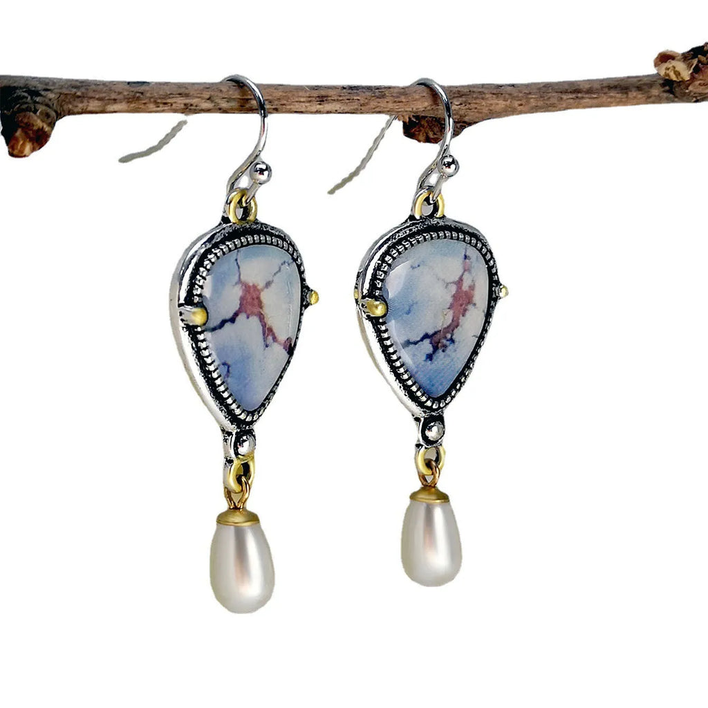 Retro blue electroplated drop earrings with geometric shape, synthetic blue opal and white pearl accents