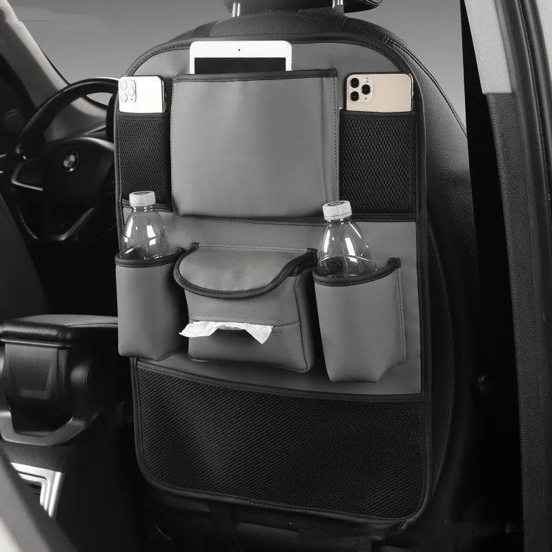 Genuine leather car seat back storage bag hanging from vehicle seat