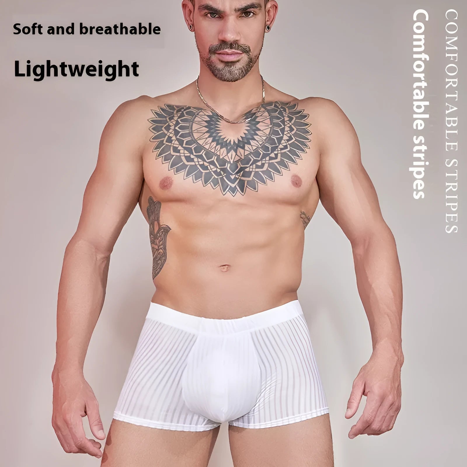 Men's thin striped nylon underwear in black, dark grey and white colours laid flat.