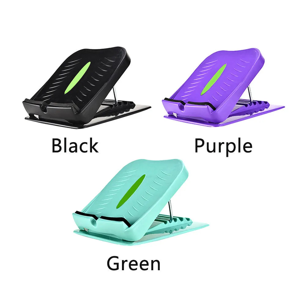 Portable black ABS calf stretching board with four adjustable incline positions on a textured surface