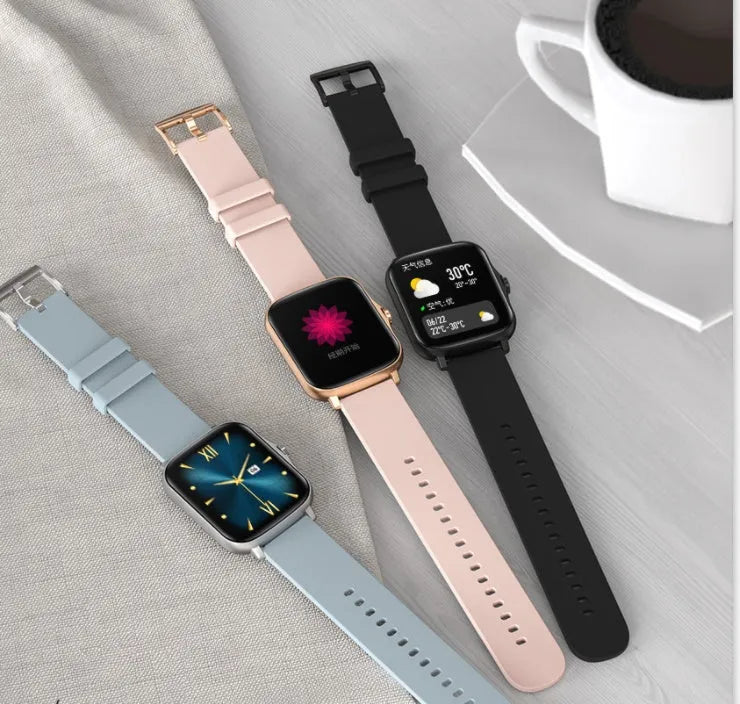 Black smart sports watch with colour touch screen on adjustable strap, showing heart rate data.