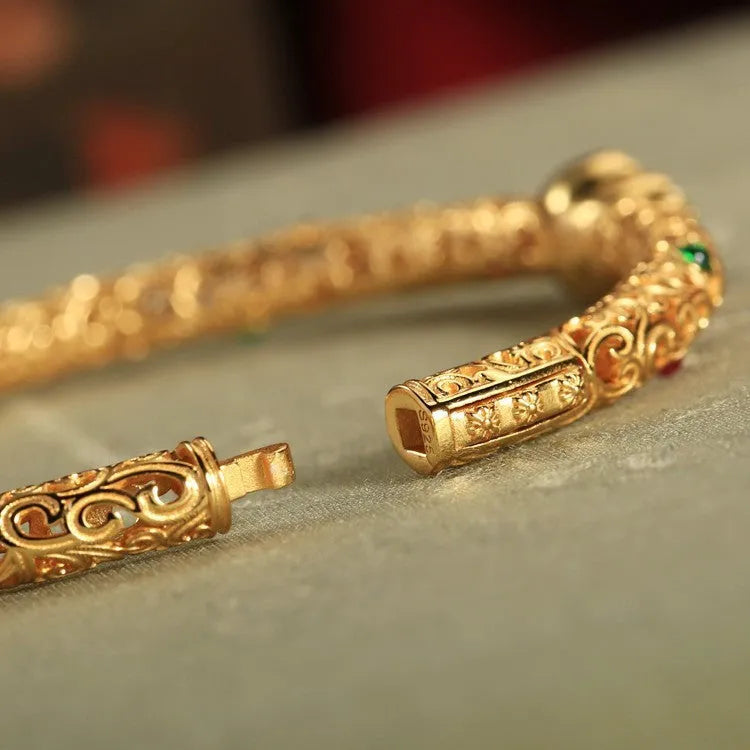 Retro women's bracelet with opening xiangyun gourd charm in gold-plated silk finish on copper base