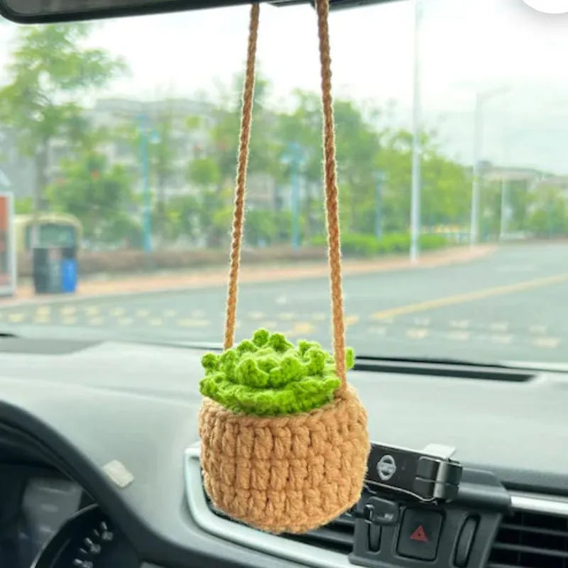 Green and white knitted wool car plant decoration with 8cm base and 25cm hanging rope