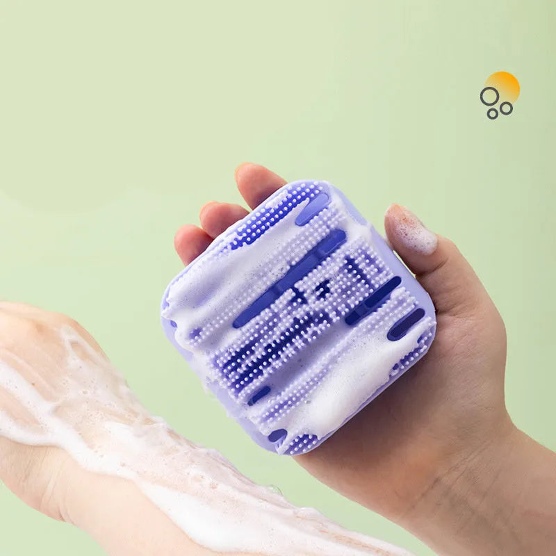 Blue silicone scalp massager shampoo brush with ergonomic handle and long bristles.