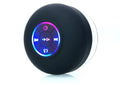 Large white waterproof Bluetooth speaker with a suction cup base and built-in LED light