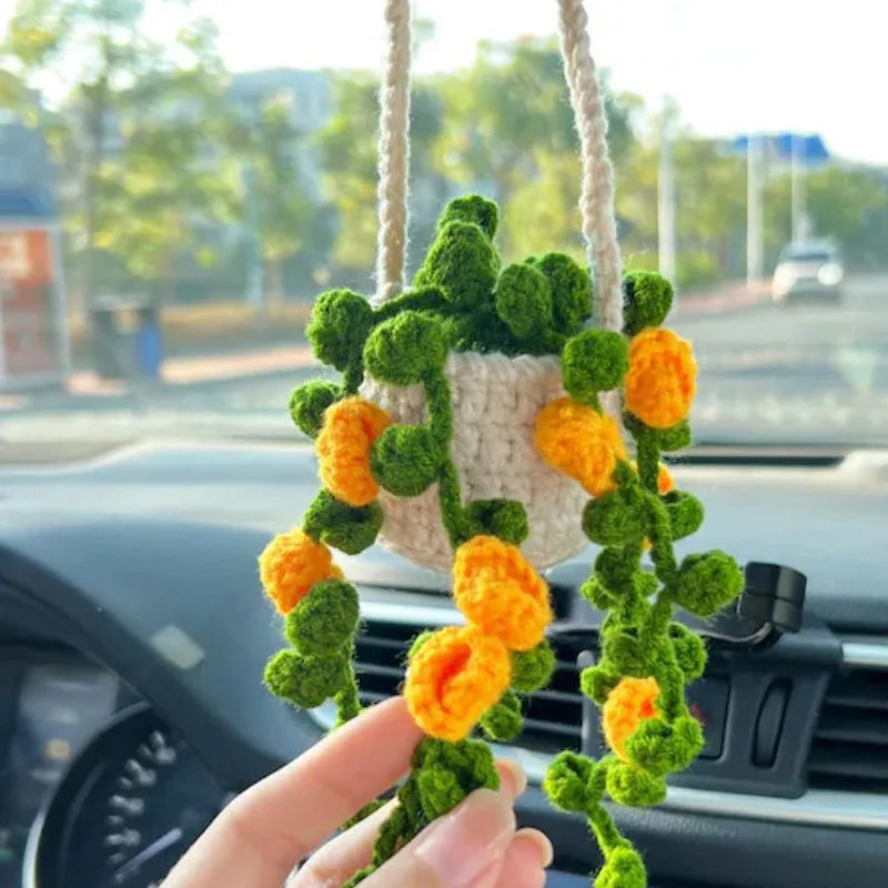 Green and white knitted wool car plant decoration with 8cm base and 25cm hanging rope
