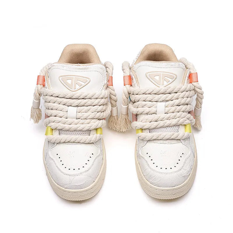 Creamy white retro skateboard shoes with old damage lace detailing and platform sole