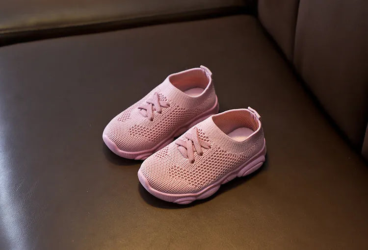 Children's fabric lazy shoes in white, black, pink, and grey colours with non-slip rubber sole
