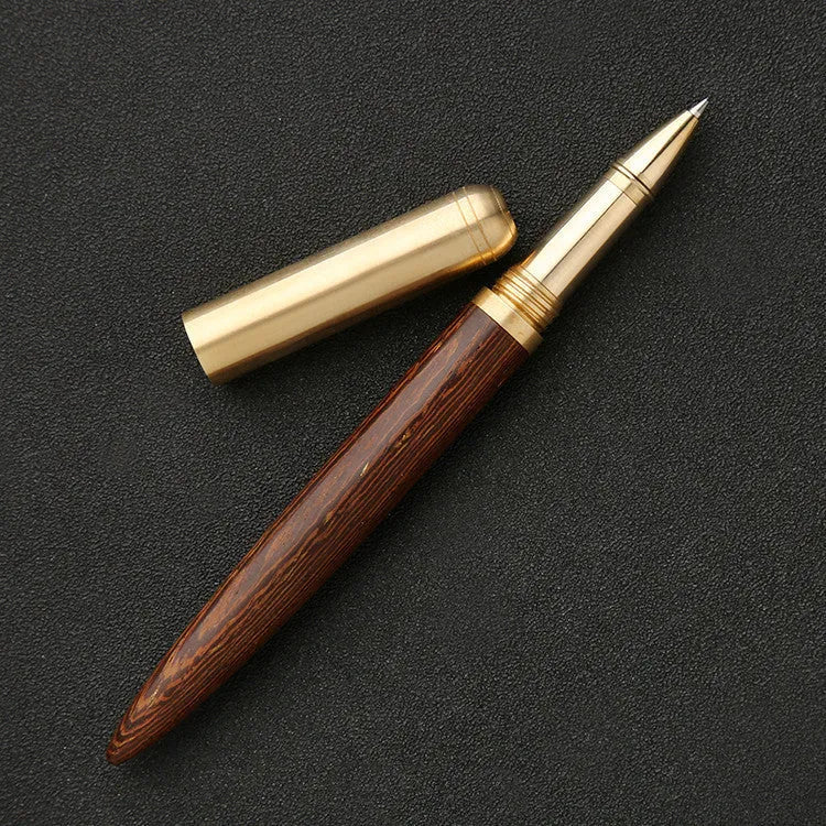 Brass and sandalwood signature pen with wooden barrel, shown alongside a ruler indicating 14 cm length.