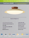 Modern cream-style flying saucer ceiling lamp in a minimalist room setting.