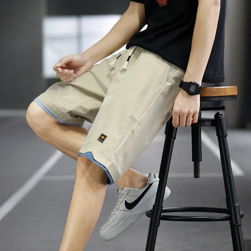 Korean style men's casual beach shorts in loose straight fit with elastic waistband