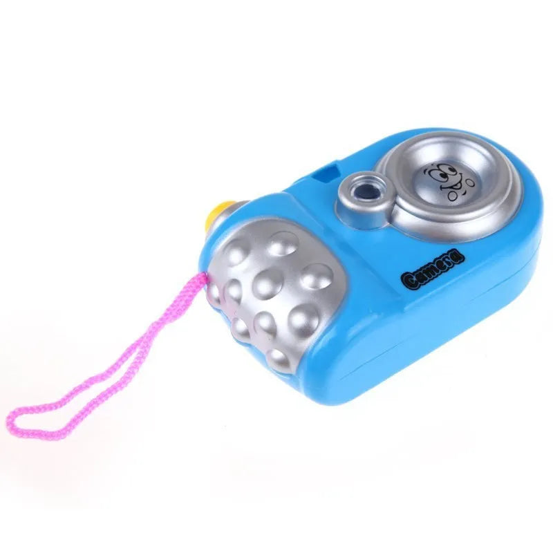 Kids educational projection camera toy showing dinosaur and dolphin images with slide switch mechanism in blue or pink colour