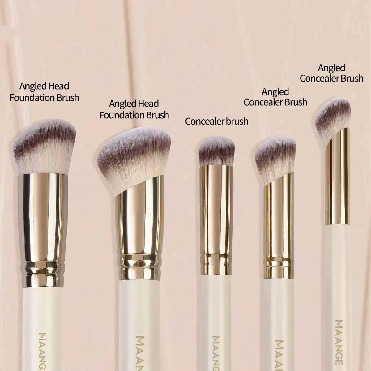 MAANGE set of five apricot-coloured makeup brushes with an angled blush brush on a grey background.