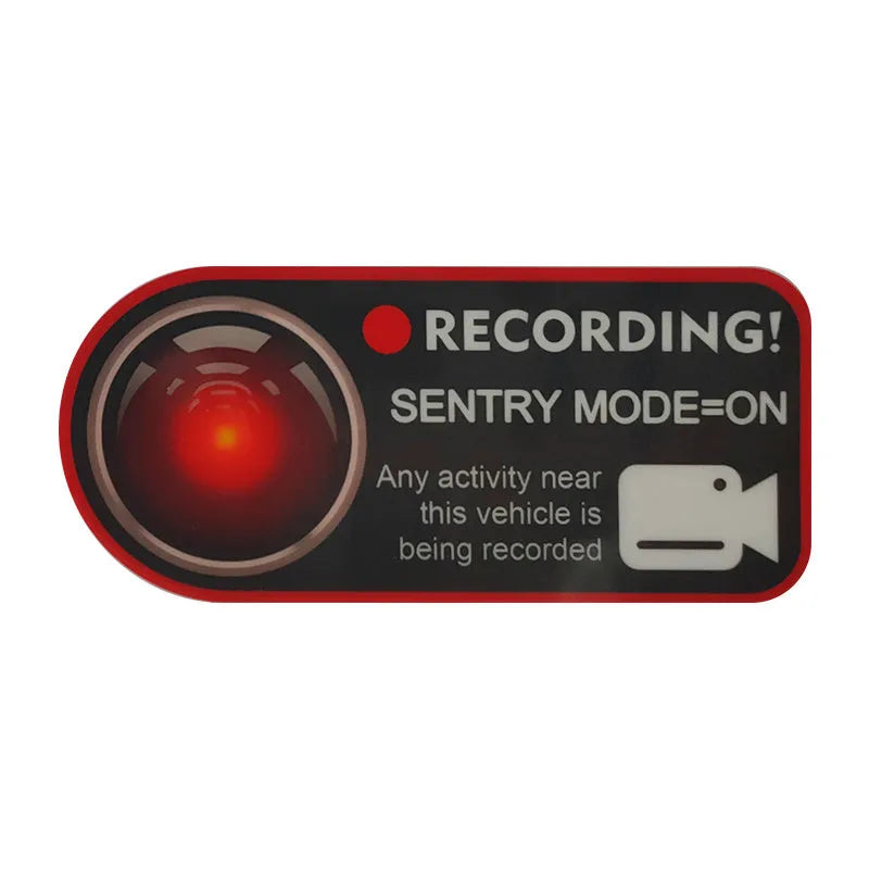 Pair of Tesla Sentry Mode warning stickers showing English text on PVC material