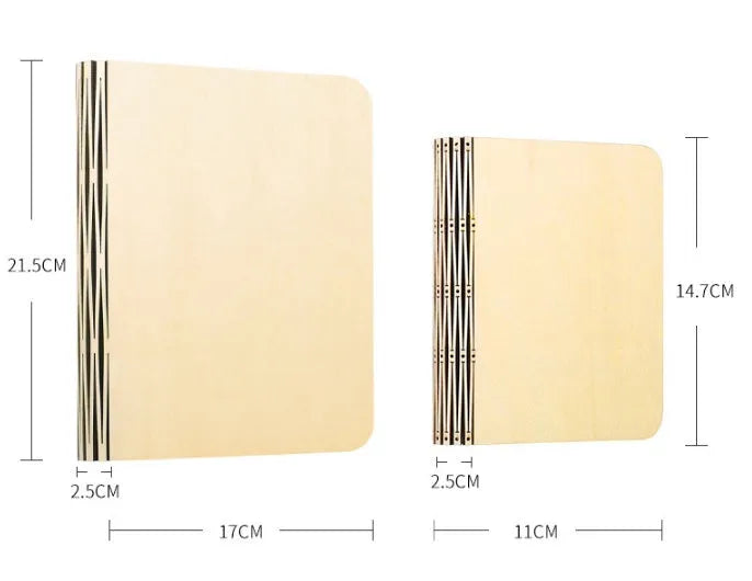 Solid wood USB book light in three sizes on a wooden table.