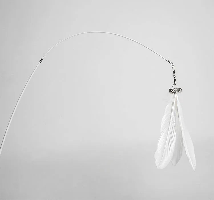 White telescopic cat fishing rod extended with goose feather lure and removable pen attachment