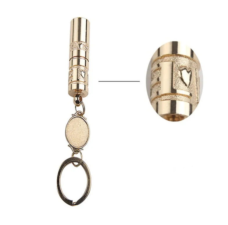 Gold electroplated zinc alloy portable LED keychain flashlight for outdoor emergency use.