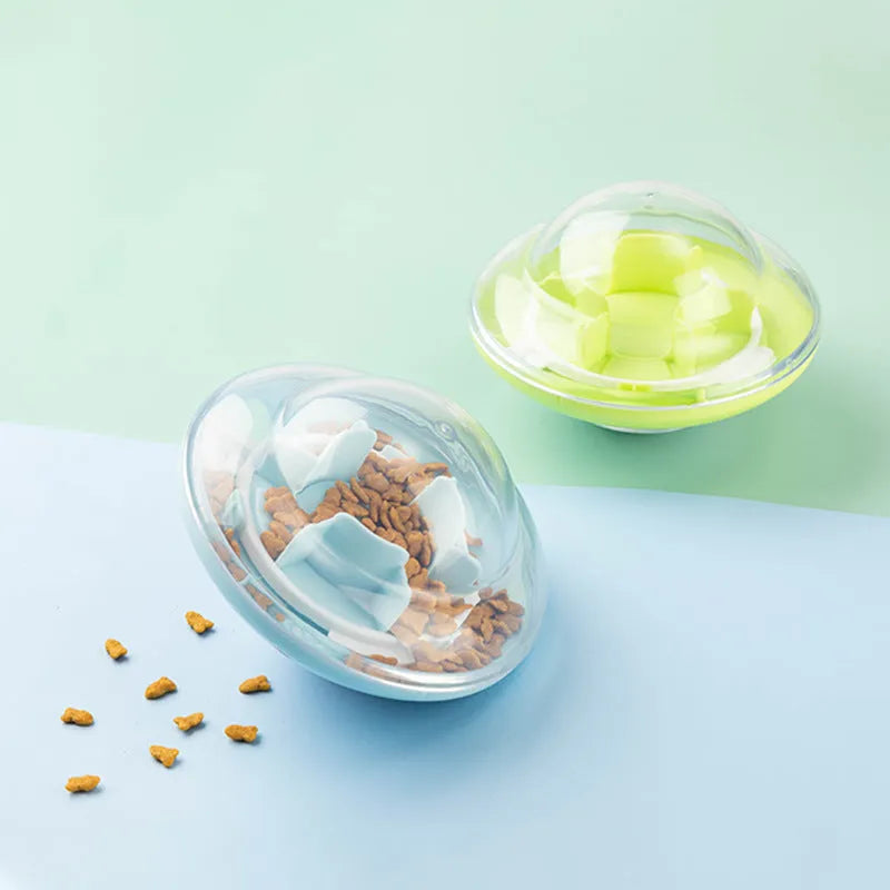 Blue pet tumbler ball toy with clear visual cabin and labyrinth column on floor