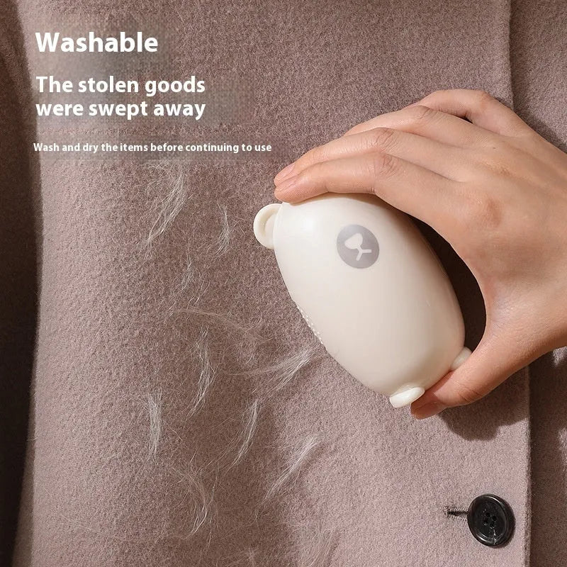 Washable lint roller in white pink or green colours with silicone adhesive surface for hair removal