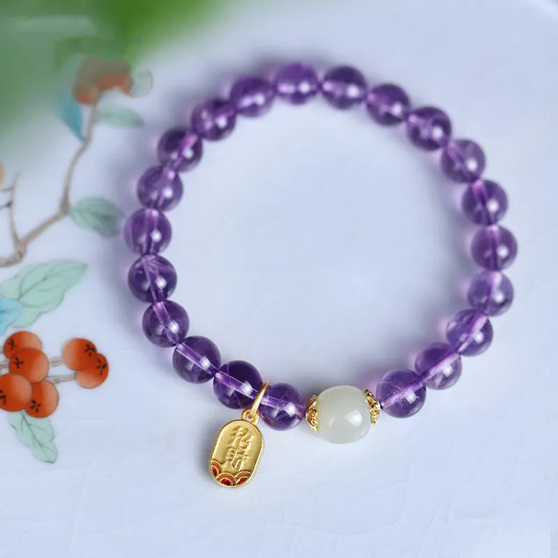Amethyst purple crystal bracelet with 8mm geometry-shaped beads on wrist